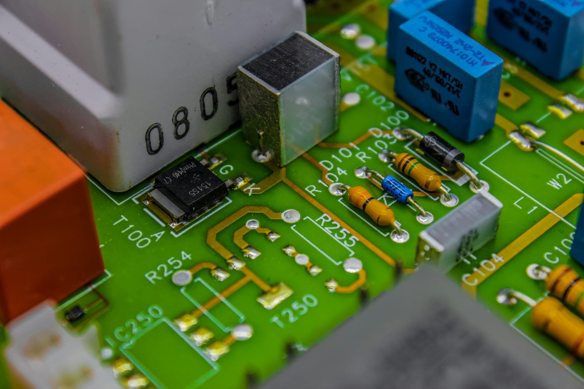 Close-up of components on a green circuit board
