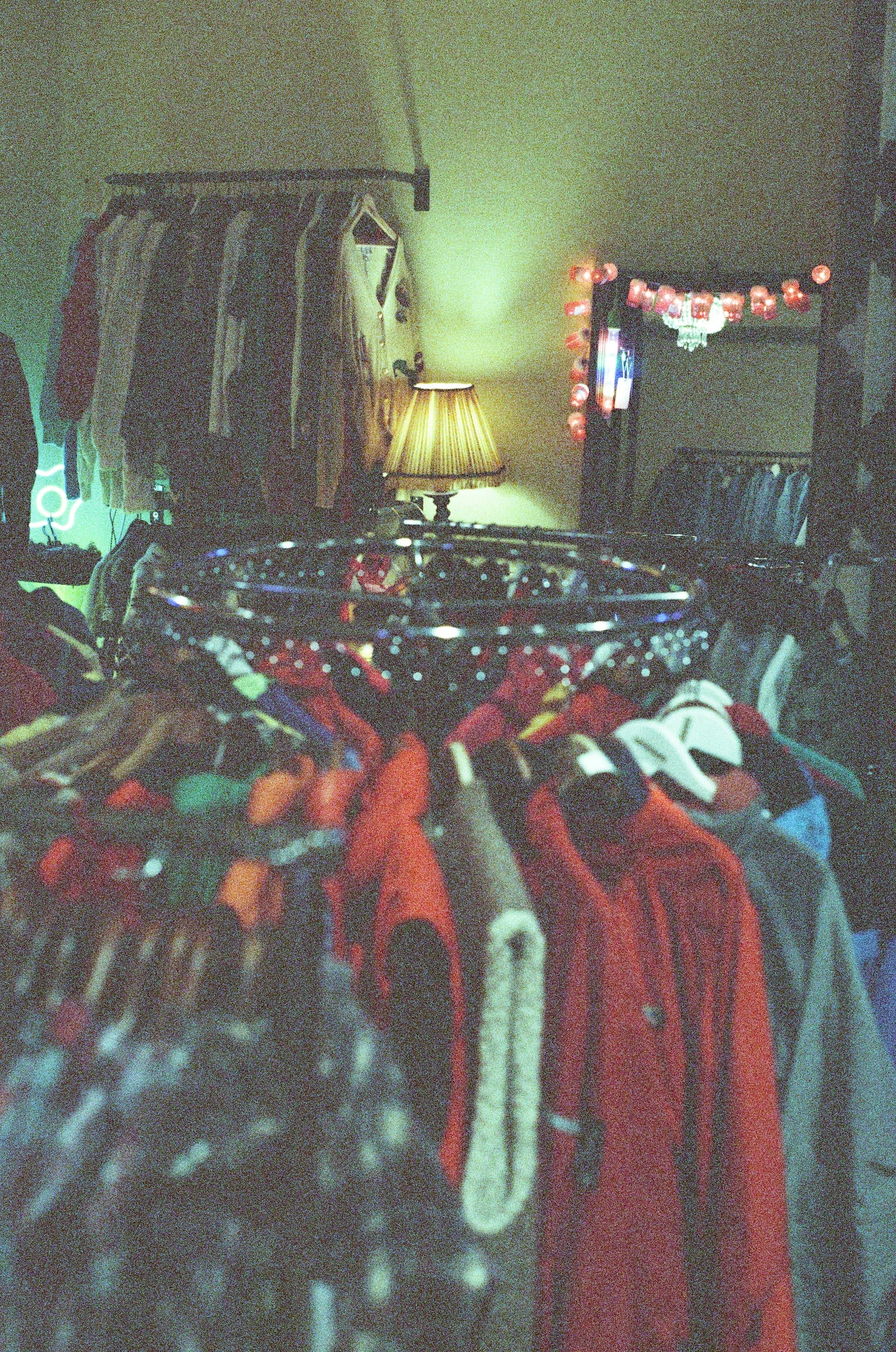 Assorted garments hanging on a clothing rail