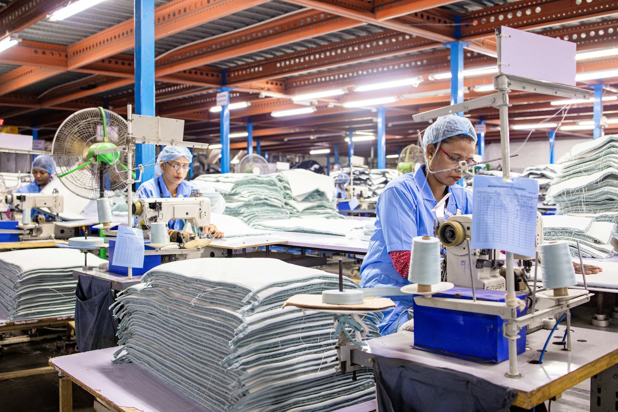 Machinists at work on a garment factory floor
